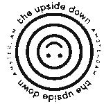 Logo van The Upside Down Amsterdam met een gestileerd omgekeerd gezicht en cirkelvormige tekst.